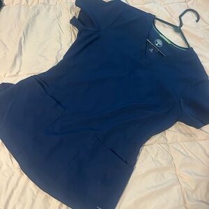 Like new XS healing hands scrub top. Gently worn.